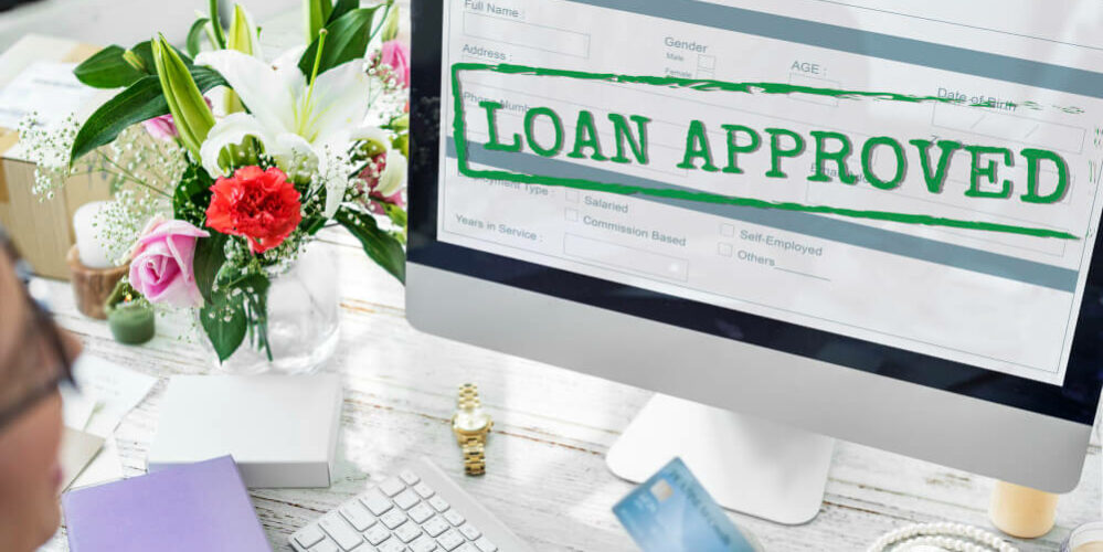 Loan Approved on Computer screen