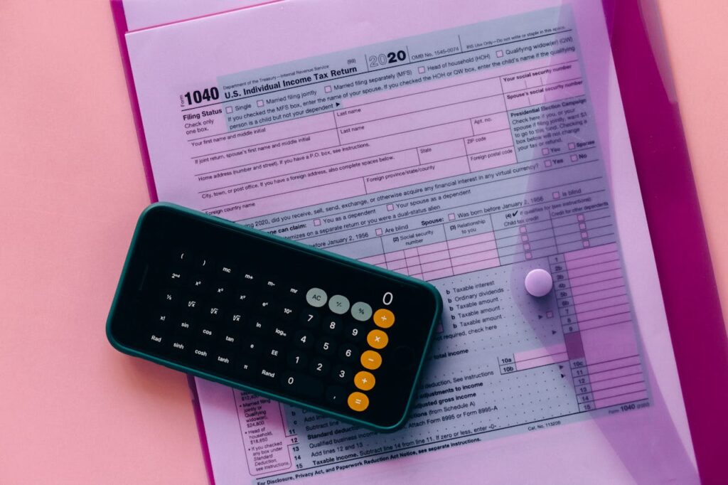 Calculator and legal paper in red light