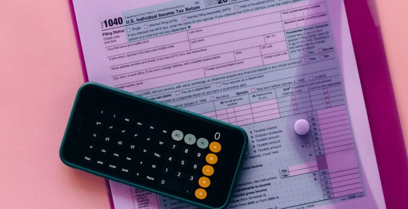 Calculator and legal paper in red light